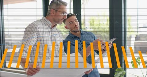 Architects Collaborating over Blueprint and Tablet Showing Financial Bar Chart Overlay