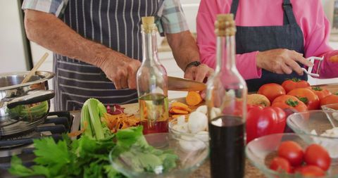 Senior Couple Cooking Together in Kitchen