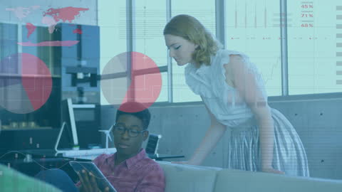 Multiracial Team Analyzing Business Data on Tablet