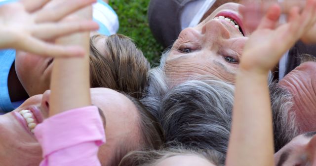 Happy Multigenerational Family Lying On Grass Outdoors - Download Free Stock Images Pikwizard.com