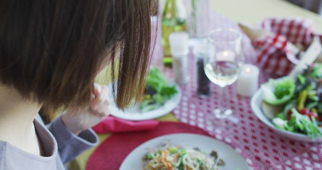 Woman Eating Meal at Restaurant Table - Download Free Stock Images Pikwizard.com