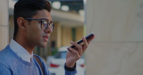 Man Engaging with Smartphone Outdoors - Download Free Stock Images Pikwizard.com
