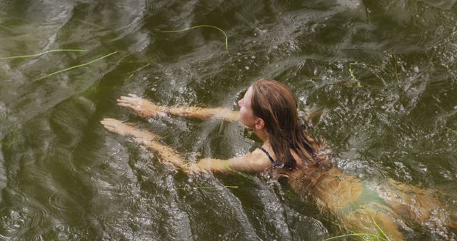 Woman Swimming in Natural Lake On Vacation - Download Free Stock Photos Pikwizard.com