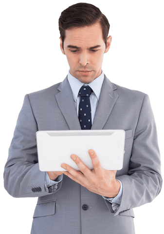 focused businessman using tablet in gray suit, transparent background - Download Free Stock Videos Pikwizard.com