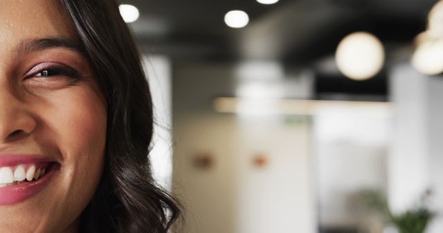 Closeup of Smiling Woman in Modern Office - Download Free Stock Images Pikwizard.com