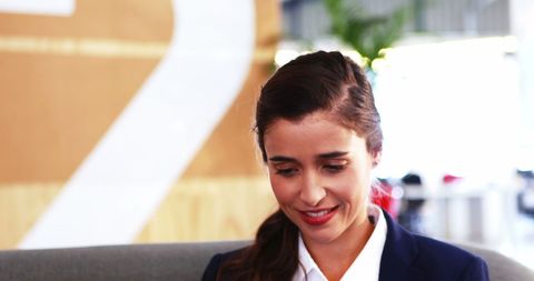 Businesswoman Using Digital Tablet in Modern Office