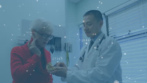 Doctor Explaining Health Concept with Digital Data Overlay
