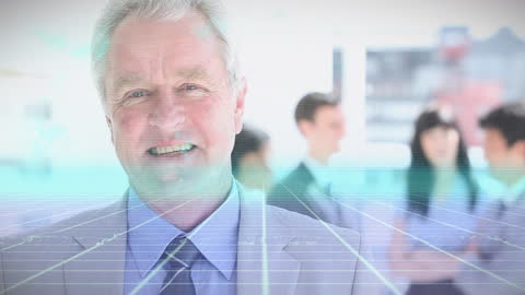 Happy Senior Businessman Overlaid with Digital Interface