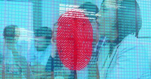 Office worker using biometric fingerprint security