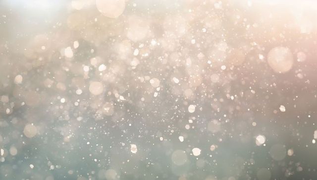 Shimmering Bokeh Gradient with Floating Dust and Warm Glowing Orbs