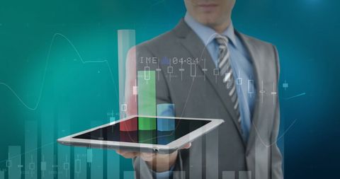 Businessman Using Tablet with Financial Graph Visualizations