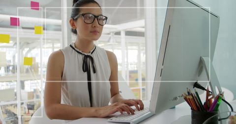 Focused Businesswoman Analyzing Financial Data on Computer - Download Free Stock Images Pikwizard.com