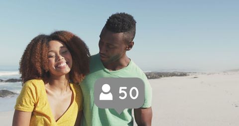 Joyful Couple Embracing Sunny Beach Moments