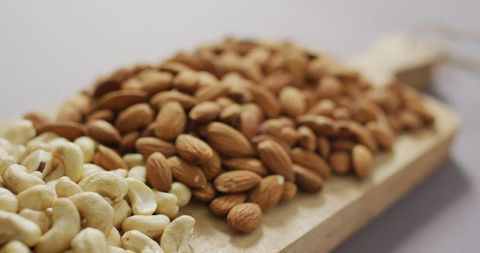 Assorted Nuts on Wooden Board for Healthy Eating Concepts - Download Free Stock Images Pikwizard.com