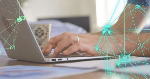 Man Connecting on Laptop with Technology Icons - Download Free Stock Images Pikwizard.com
