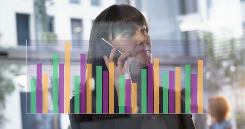 Businesswoman Discussing Data Analysis on Smartphone - Download Free Stock Images Pikwizard.com