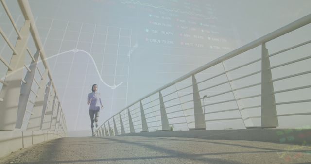 Businesswoman in hijab jogging on modern bridge with financial graphs overlay - Download Free Stock Images Pikwizard.com