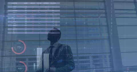 Businessman Examining Stock Market Data Projections