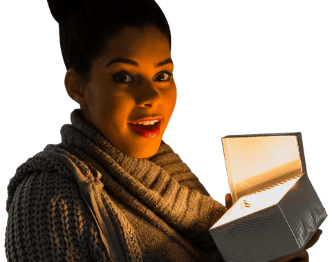 Smiling woman holding glowing gift on transparent background
