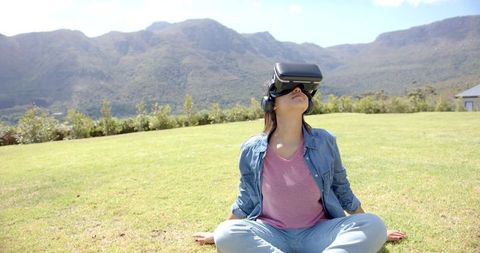 Woman Relaxing Outdoors with Virtual Reality Headset - Download Free Stock Images Pikwizard.com
