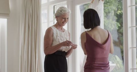 Bride Sharing Special Moment With Elder Woman Before Ceremony