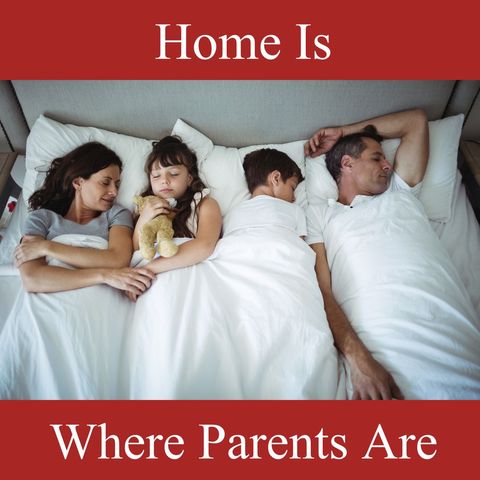 Family Sleeping Together Celebrating Parent-Child Bond