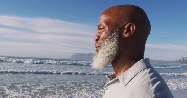 Senior African American Man Enjoying Ocean View at Beach - Download Free Stock Images Pikwizard.com