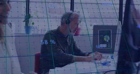 Professional Senior Man with Headset in Modern Office Workspace