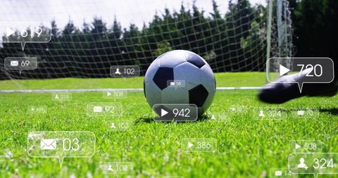 Soccer striker kicking ball to goal with social media overlay and goalkeeper diving save