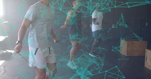 People Skipping Rope in Gym with Digital Graph Overlays