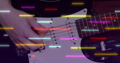 Vibrant Electric Guitar Performance with Creative Color Effects