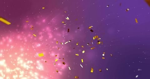 Drifting gold confetti and shimmering ribbons over purple-pink bokeh glow background