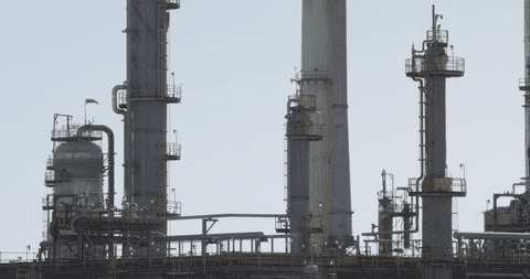vertical industrial towers on blue sky background - Download Free Stock Videos Pikwizard.com