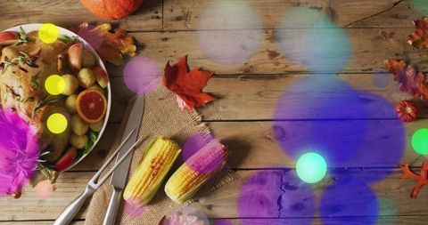 Thanksgiving Roasted Turkey with Grilled Corn on Rustic Wooden Table, Autumn Bokeh