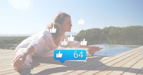 Woman stretching on wooden deck by infinity pool with floating social likes and 64 bubble