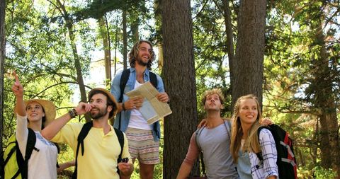 Diverse Young Adults Enjoying Adventure Hiking Through Lush Forest - Download Free Stock Images Pikwizard.com