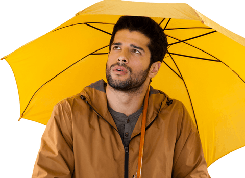 Thoughtful man holding vibrant yellow umbrella on transparent background