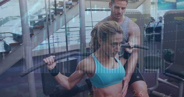 Personal Trainer Assisting Woman with Lat Pulldown in Gym - Download Free Stock Images Pikwizard.com