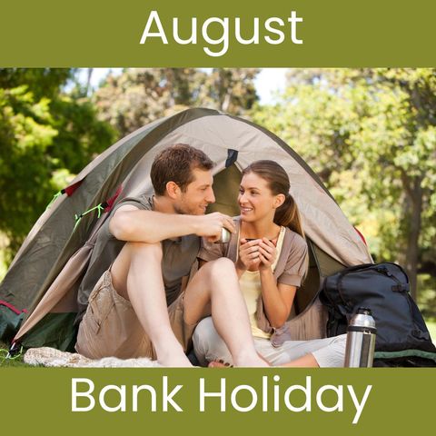 Happy Eco Travel Couple Relaxing Near Tent in Sunny Forest