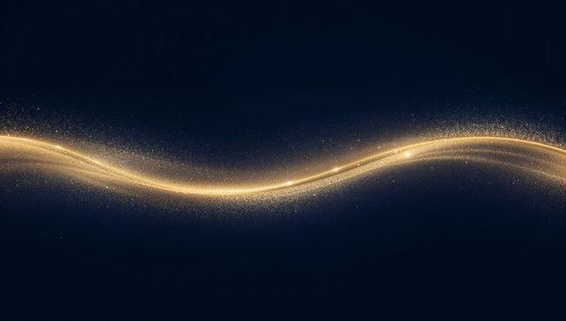 Luminous gold wave on deep navy background with sparkling particle trail and flares