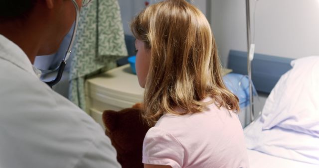 Doctor Examining Child in Hospital Room - Download Free Stock Images Pikwizard.com