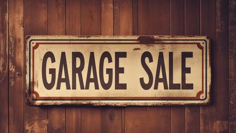Vintage Distressed Garage Sale Sign on Wooden Wall
