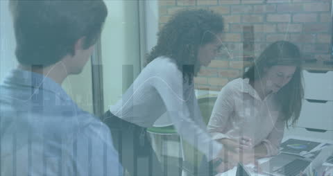 Team Analyzing Financial Data in Modern Office with Overlay