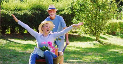 Senior couple enjoying gardening adventures together