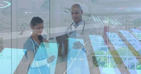 Medical Professionals Analyzing Data in Modern Healthcare Facility