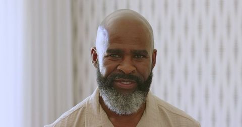 Elegant Smiling Man at Formal Indoor Celebration Event