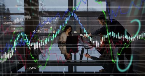 Business People Analyzing Complex Financial Data Charts