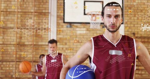 Basketball player holding blue ball while facing camera with sports analytics overlay on court