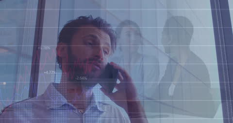 Businessman Analyzing Data with Virtual Analytics Hologram