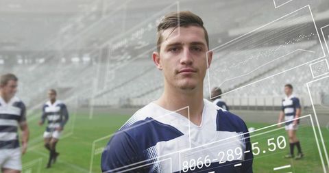 Standing rugby player wearing navy and white kit with digital performance overlays